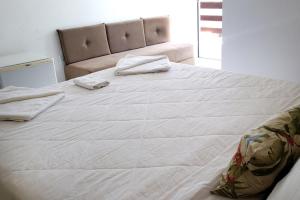 Cama ou camas em um quarto em Pousada Kairos & Spa em Búzios