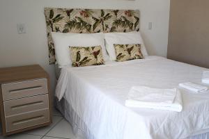 Cama ou camas em um quarto em Pousada Kairos & Spa em Búzios