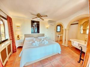 Ein Bett oder Betten in einem Zimmer der Unterkunft Villa Sun Carlos