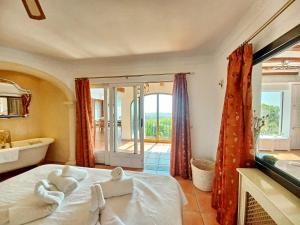Ein Bett oder Betten in einem Zimmer der Unterkunft Villa Sun Carlos