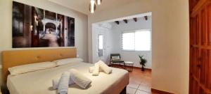 Ein Bett oder Betten in einem Zimmer der Unterkunft Villa Sun Carlos