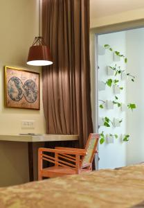 Cama ou camas em um quarto em The Avatar Hotel & Convention