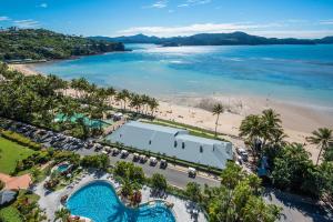 an aerial view of a resort and a beach at Whitsunday East 1106 on Hamilton Island by HamoRent in Hamilton Island