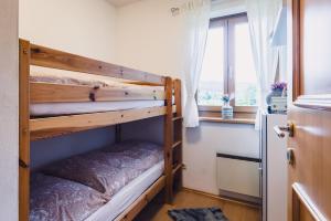 Letto o letti in una camera di Die Lärchen-Lodge