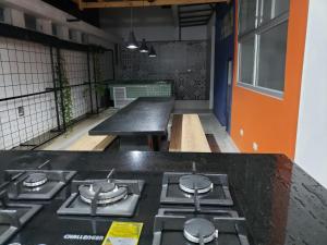 A kitchen or kitchenette at Aima Ibagué