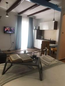 TV a/nebo společenská místnost v ubytování Amerikon
