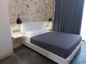Posteľ alebo postele v izbe v ubytovaní The Santo George Beach Resort