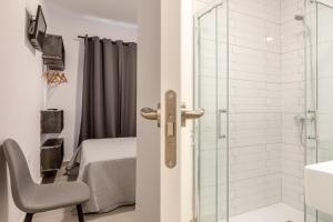 Koupelna v ubytování Villamarta Boutique Rooms + 37 fotografií