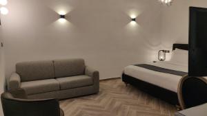 Postel nebo postele na pokoji v ubytování Casa Reale Boutique Hotel