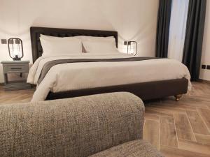 Postel nebo postele na pokoji v ubytování Casa Reale Boutique Hotel