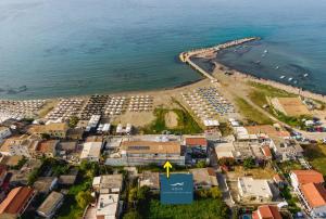 an aerial view of a beach with a resort at Aqua Luxury Suites by Estia in Roda