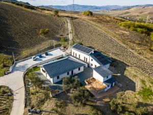 an aerial view of a house with solar panels on its roof at Casa Dolce Casa - Casa Vacanze in Ariano Irpino