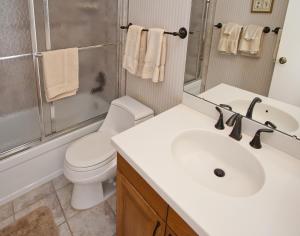 a bathroom with a sink and a toilet and a shower at All Seasons G4 Condo in Vail +15 photos