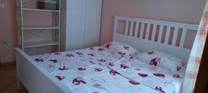 Postel nebo postele na pokoji v ubytování Apartments Skalin
