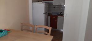 Kuchyň nebo kuchyňský kout v ubytování Apartments Skalin