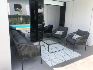 A seating area at Casa de lujo frente a la playa de Es Trenc