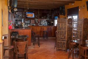Lounge alebo bar v ubytovaní Hostal Pension La Ruta