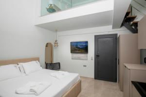 Posteľ alebo postele v izbe v ubytovaní B&D Luxury Suites