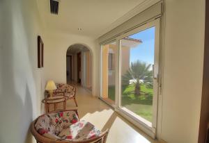 a living room with a large sliding glass door at Luxurius Villa with private pool in Mijas