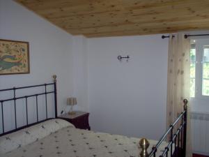 Posteľ alebo postele v izbe v ubytovaní Apartamento El Dragon Serrano