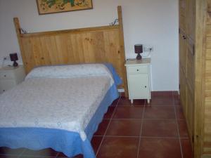 Posteľ alebo postele v izbe v ubytovaní Apartamento El Dragon Serrano