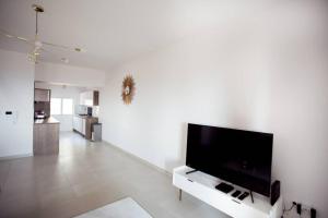 Televízia a/alebo spoločenská miestnosť v ubytovaní Magnifique appartement avec vue imprenable