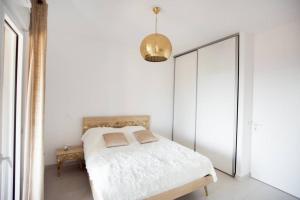 Posteľ alebo postele v izbe v ubytovaní Magnifique appartement avec vue imprenable