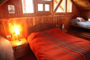 Krevet ili kreveti u jedinici u okviru objekta La Polcura Lodge Turismo -Fishing Lodge & Spa