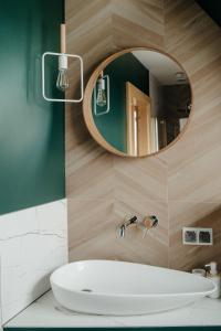 Kúpeľňa v ubytovaní Osada Witów - apartament „Czerwone Wierchy”