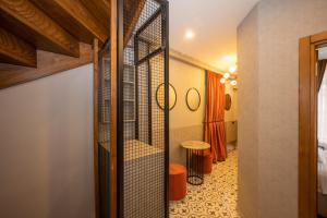 a room with a gate leading into a room with a hallway at TAKSİM SUİTE in Istanbul +105 photos