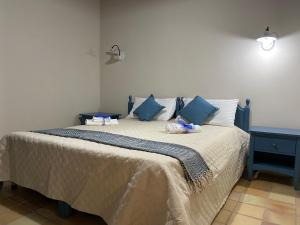 Postel nebo postele na pokoji v ubytování B&B La Dimora del Contadino