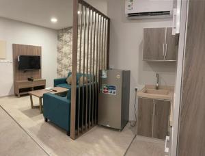 Kuchyň nebo kuchyňský kout v ubytování Al-Haramain Family Apartments