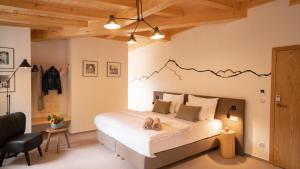 Llit o llits en una habitació de Hotel Soyka