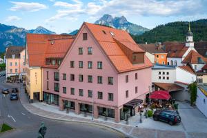 an overhead view of a town in the mountains at Hotel Sonne in Füssen