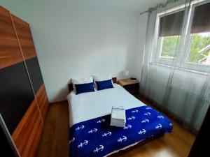 Postel nebo postele na pokoji v ubytování Piętówka