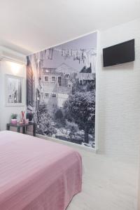 Televízia a/alebo spoločenská miestnosť v ubytovaní Apartments Orka