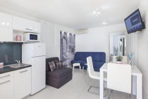 Kuchyňa alebo kuchynka v ubytovaní Apartments Orka