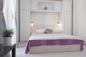 Posteľ alebo postele v izbe v ubytovaní Apartments Orka