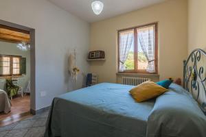 Postel nebo postele na pokoji v ubytování Casa Magica