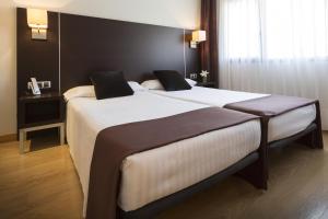 
Cama o camas de una habitación en Hotel Plazaola
