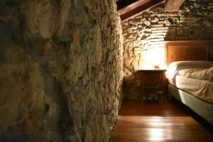 Postel nebo postele na pokoji v ubytování Cascina Belvedì