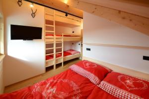 Letto o letti in una camera di Almchalet Hüttenzauber