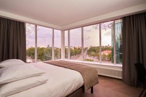 Uma cama ou camas num quarto em Nordic Hotel Forum