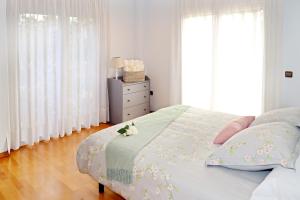 A bed or beds in a room at Casa Escardill