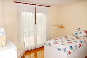 A bed or beds in a room at Casa Escardill