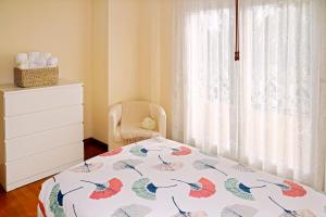 A bed or beds in a room at Casa Escardill