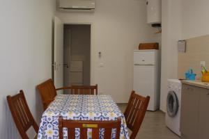 Kuchyň nebo kuchyňský kout v ubytování casa sandrina piano terra + 25 fotografií