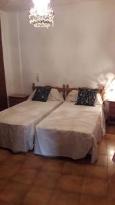 Cama o camas de una habitación en Casa centro Enguidanos