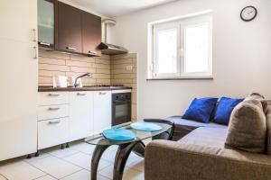 Dapur atau dapur kecil di Sunny Old Town Apartment