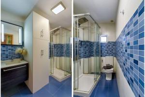 Kúpeľňa v ubytovaní Riazor Bay by TheBlueWaveApartments com